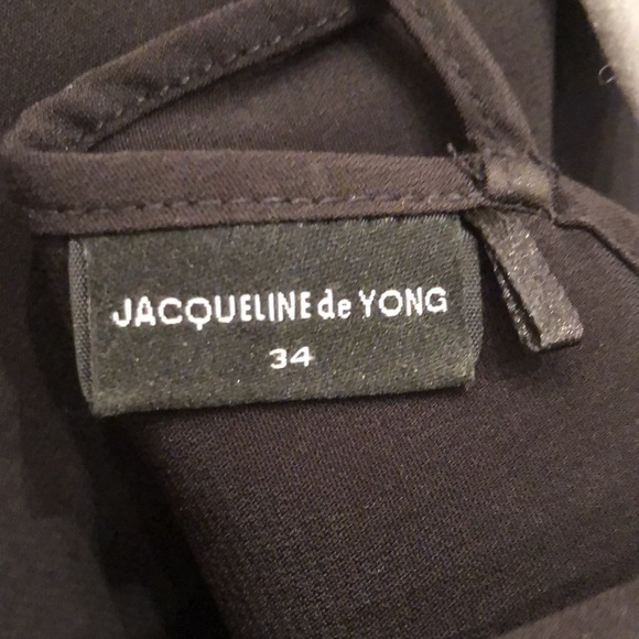 Black mini dress with sheer polka dot short sleeves. Size EU 34. - Picture 3 of 3